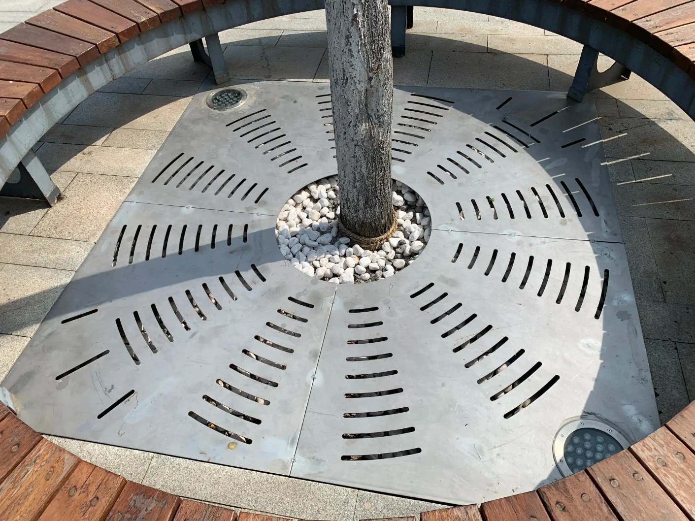 stainless steel landscaping tree grate for urban outdoor spaces and site furnishing applications