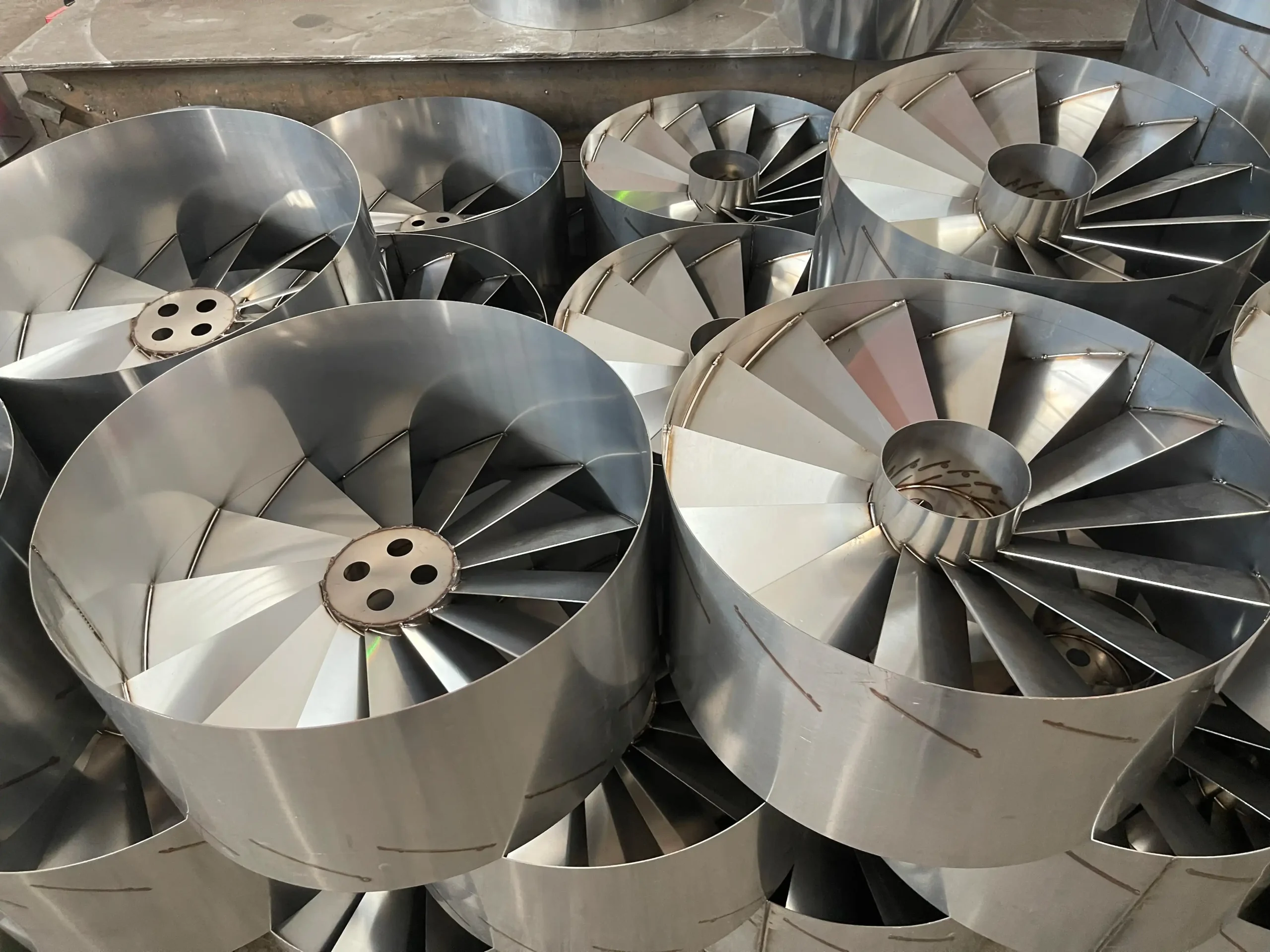 Custom stainless steel centrifugal fan impellers and air duct housings fabricated by ZEMSS China