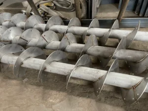 Stainless steel screw conveyor auger flights fabricated by ZEMSS – custom pipe and spiral fabrication China