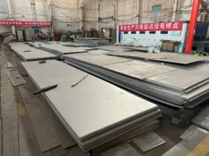 Stainless steel sheet metal stock in large format sizes stored in ZEMSS fabrication workshop China